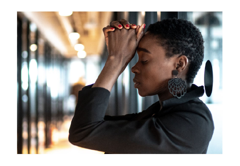 Woman with hands clasped