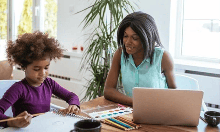 mother-working-laptop-child